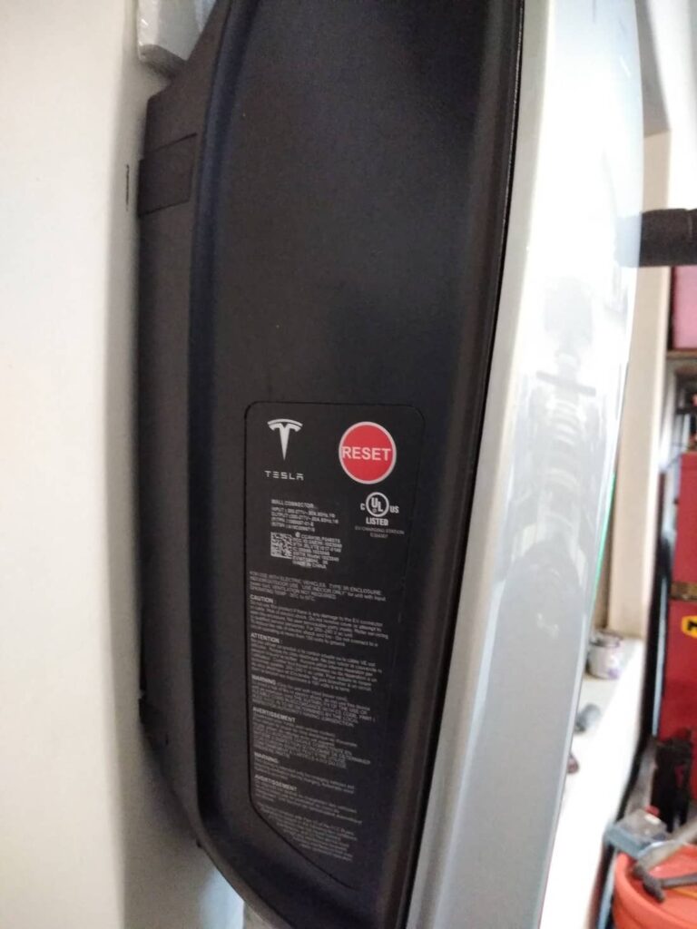 Tesla wall chargers reset button.